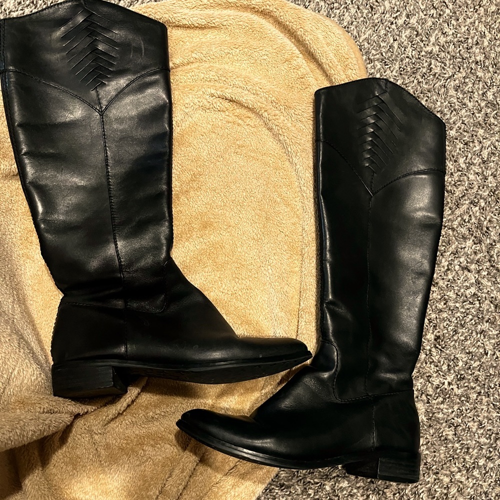 Tall black leather boots